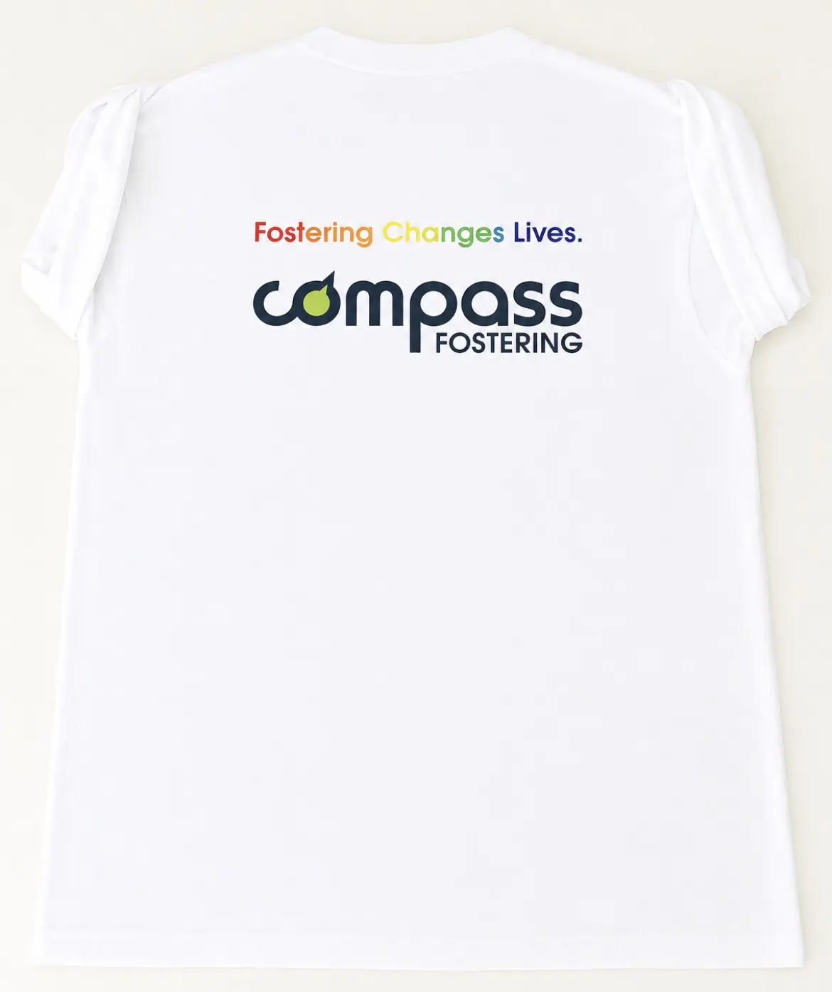 Compass Fostering Pride t-shirt with the message “Fostering Changes Lives.”